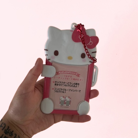 𝚂𝙰𝙽𝚁𝙸𝙾 𝙸𝙳 - 𝙿𝙸𝙲𝚃𝚄𝚁𝙴 𝙷𝙾𝙻𝙳𝙴𝚁 - Picture 2 of 4